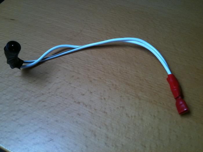 Power lead fitted with red crimp connectors