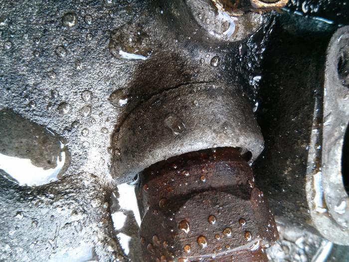 Close-up of a hairline crack in the old engine