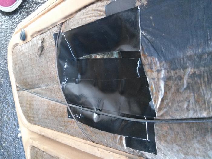 Underside of the T25 engine cover with the insulation removed