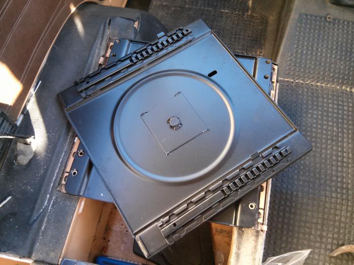 Seat swivel base from Just Kampers, being fitted to a t25 camper