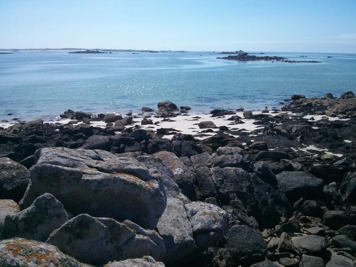 Rocky shoreline and blue sea