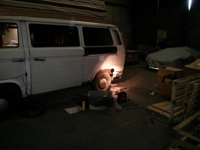 Rocky in a workshop getting some bodywork attention