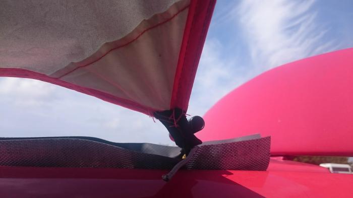 Tarp attachment point on the van's roof