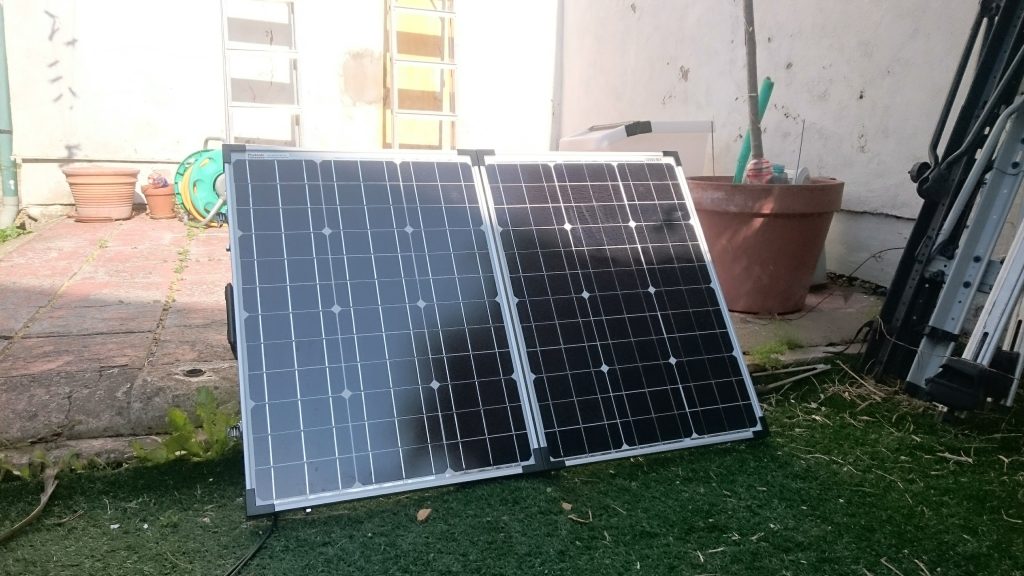 Solar panel in a shady garden